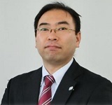 深津学治の顔写真